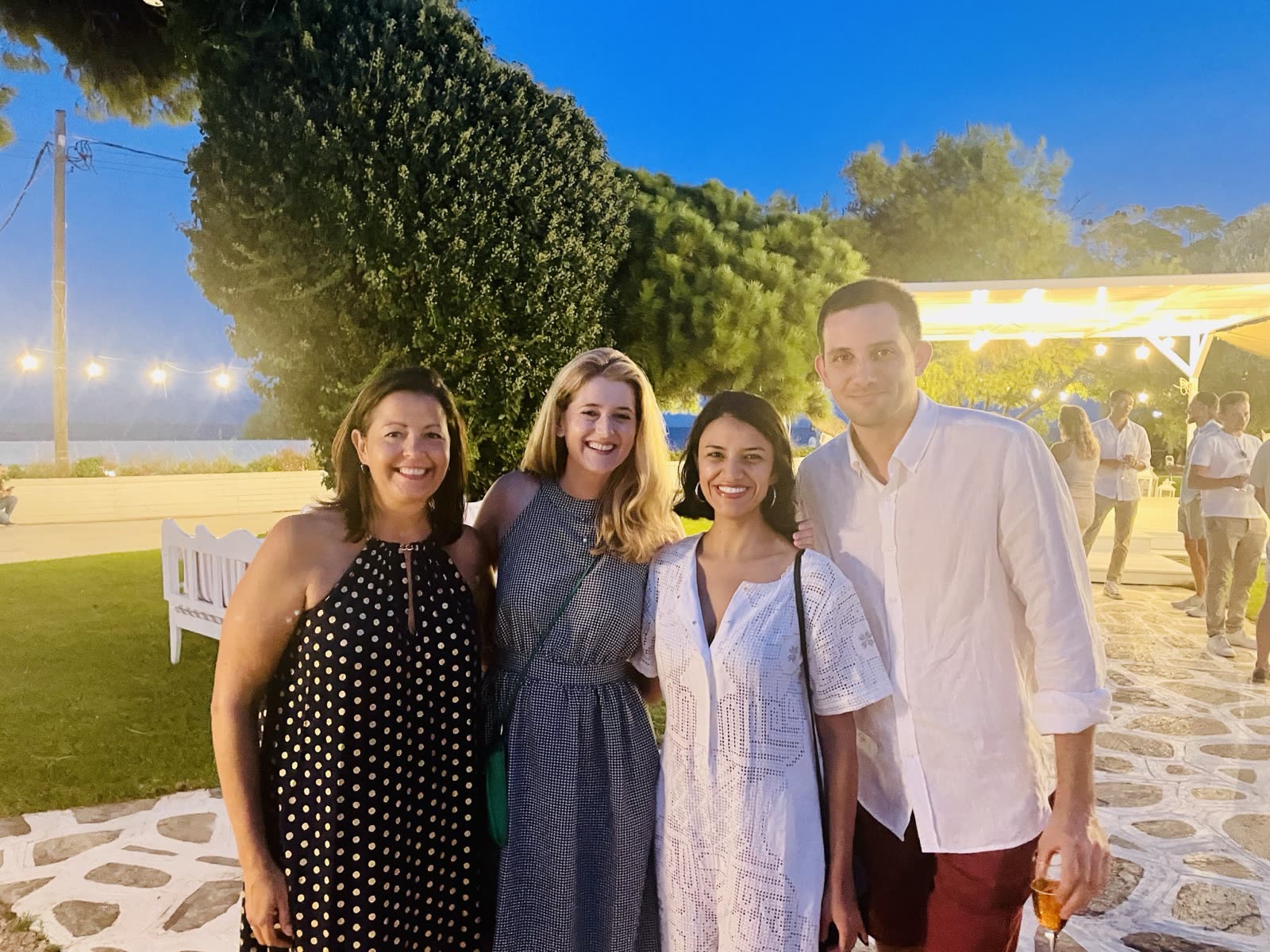 Four members at golden hour