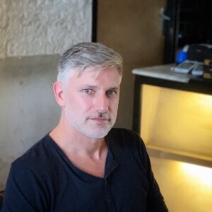 Adrian M Odgers